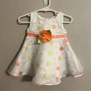 Charming Polka Dot Kids Dress with Floral Accent
